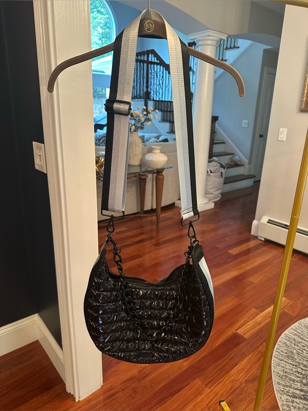 Black Quilted Crossbody Bag with Wide Stripe Strap